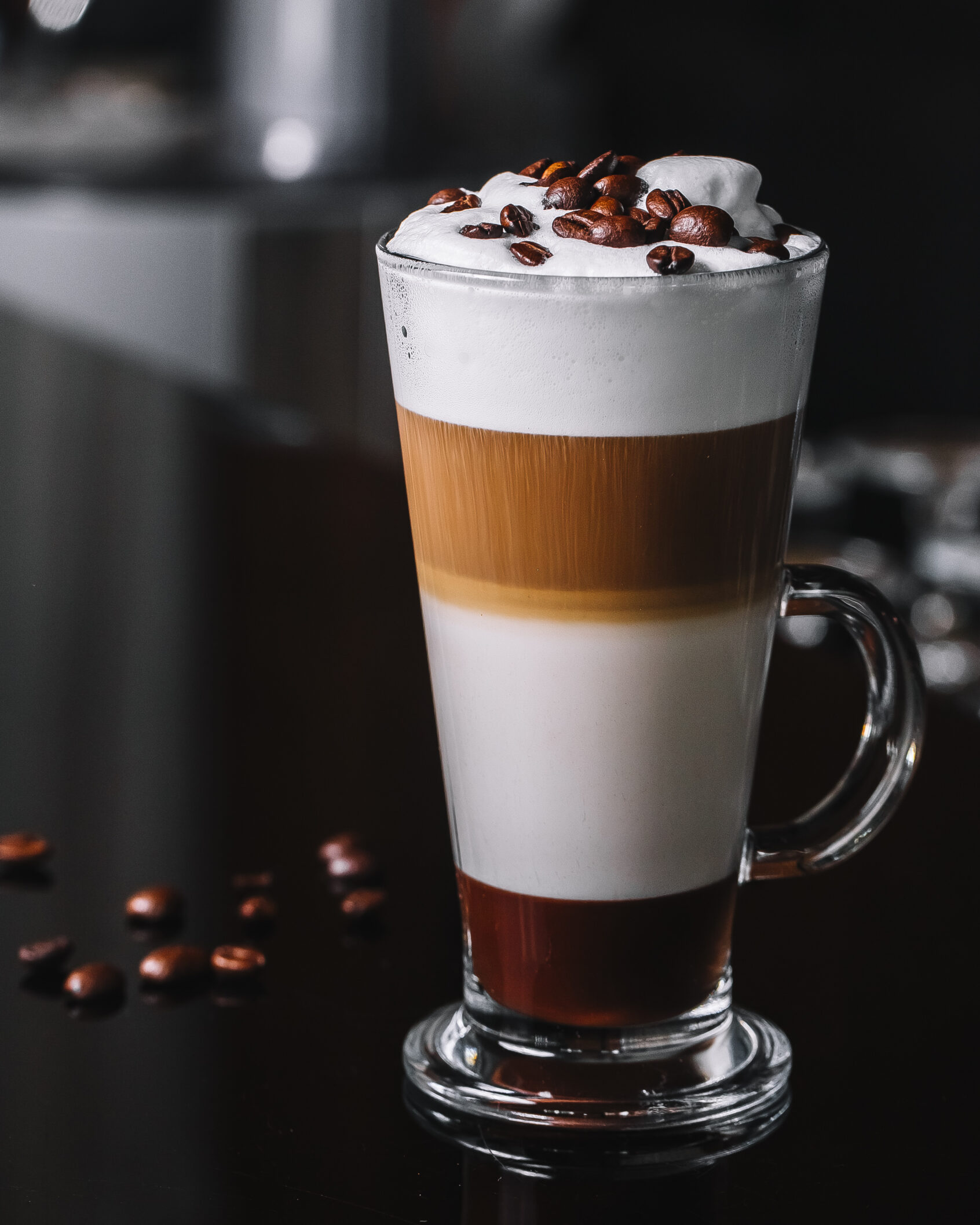 front view coffee latte with coffee beans